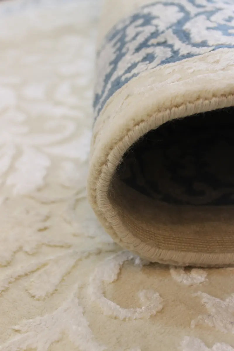 El Dokuma Mavi Uşak Desenli Yün Halı