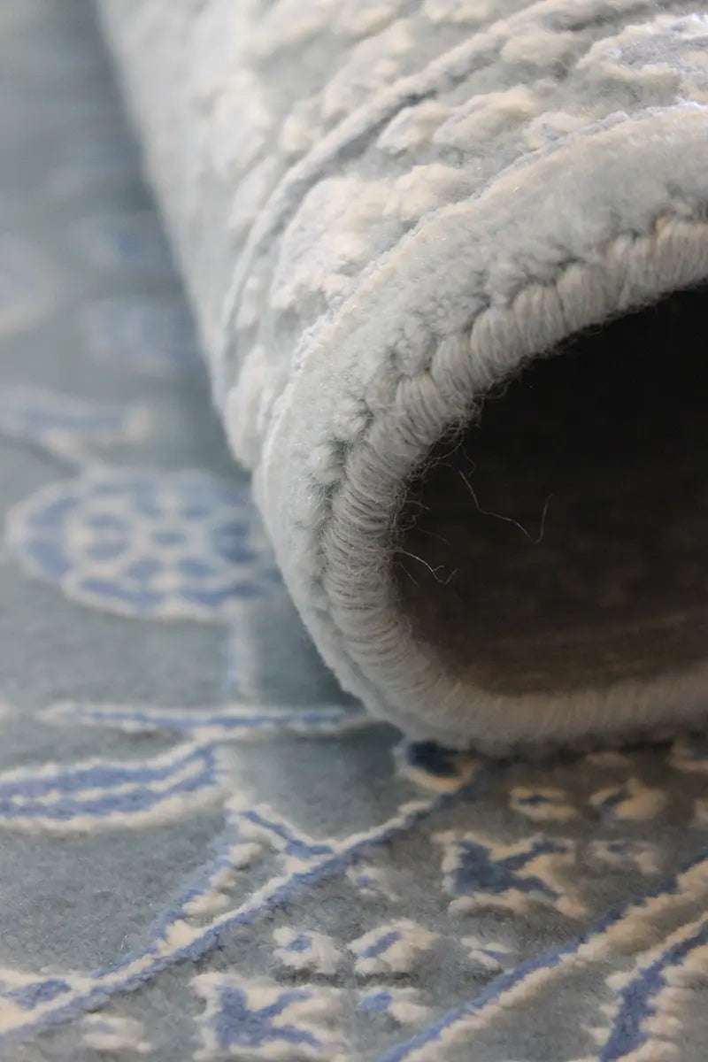 El Dokuma Mavi Uşak Desenli Yün Halı