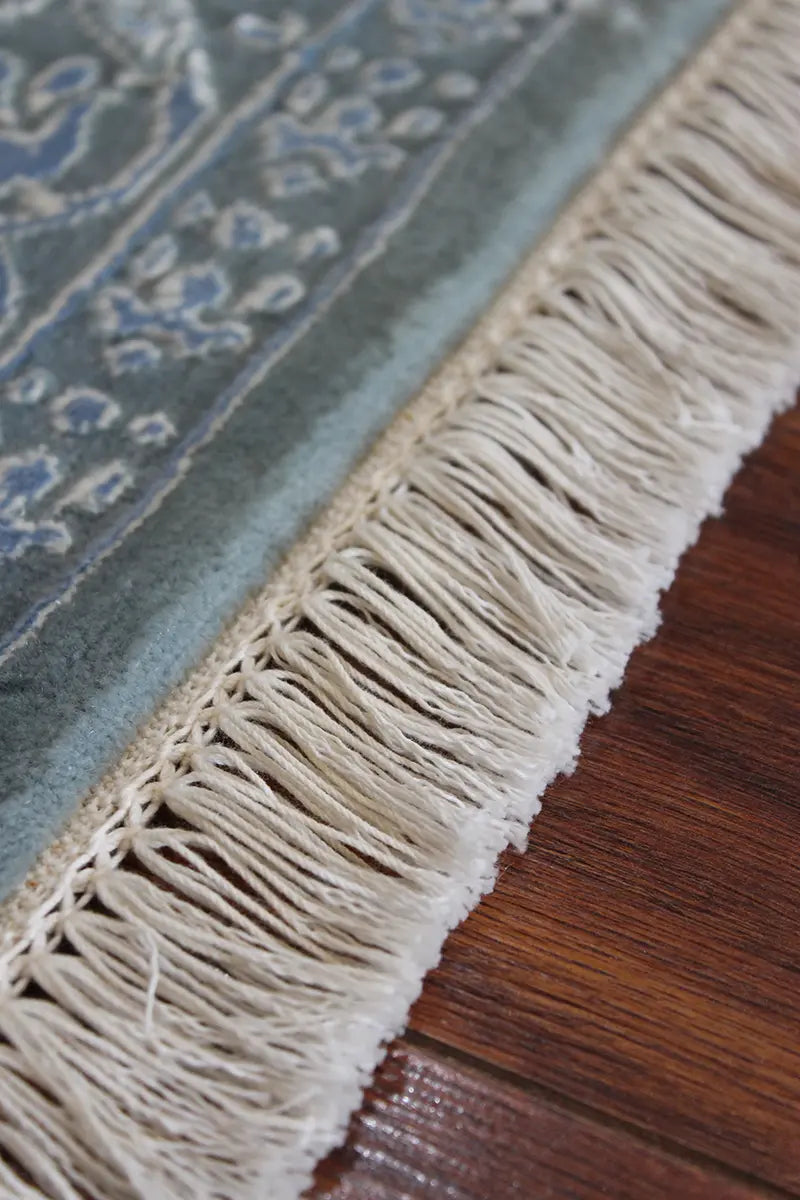 El Dokuma Mavi Uşak Desenli Yün Halı